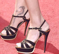 Conseils beauté de star: Adriana Lima et tatouage